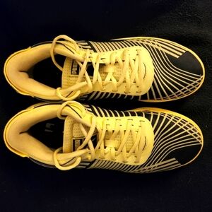 Puma Black and Gold Athletic Shoes